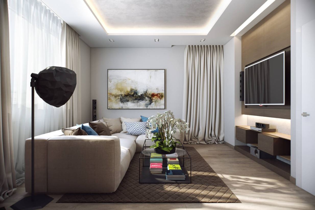 Цвет ковра на светлом полу перекликается с оттенком корпусной мебели и вносит цветовой баланс в небольшую гостиную